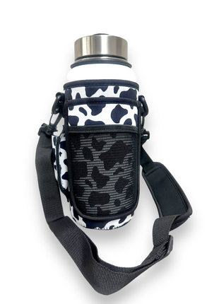 Black and White Cow Print 30-40oz Tumbler Handler™ With Carrying Strap - Drink Handlers