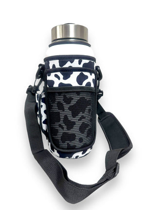 Black and White Cow Print 30-40oz Tumbler Handler™ With Carrying Strap - Drink Handlers