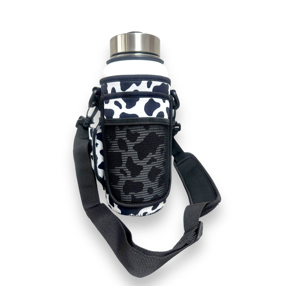 Black and White Cow Print 30-40oz Tumbler Handler™ With Carrying Strap - Drink Handlers