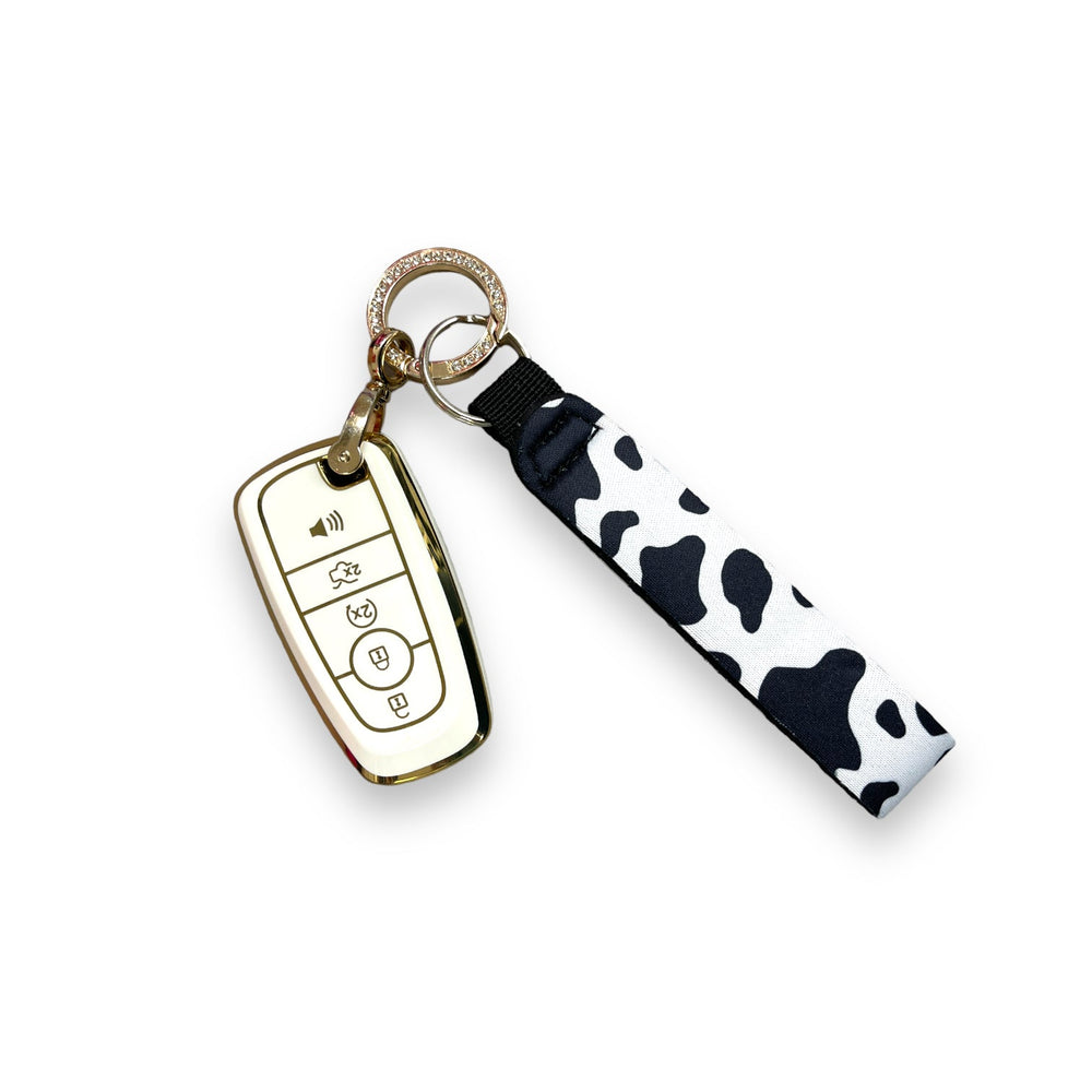 Black and White Cow Print Wristlet Keychain - Drink Handlers